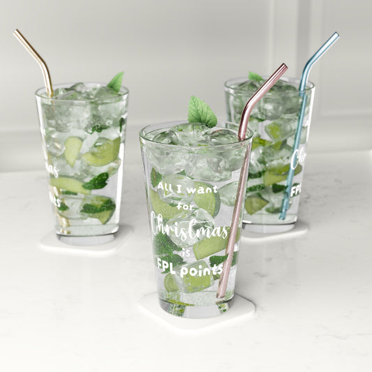 Three clear glass tumblers with metal straws on white coasters, filled with iced mint mojitos, on a light marble surface. The front tumbler has white script text reading 'All I want for Christmas is EPL points'.