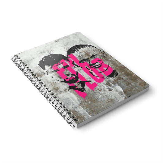 Notebook with a graphic design on the cover featuring a face and text, on a white background