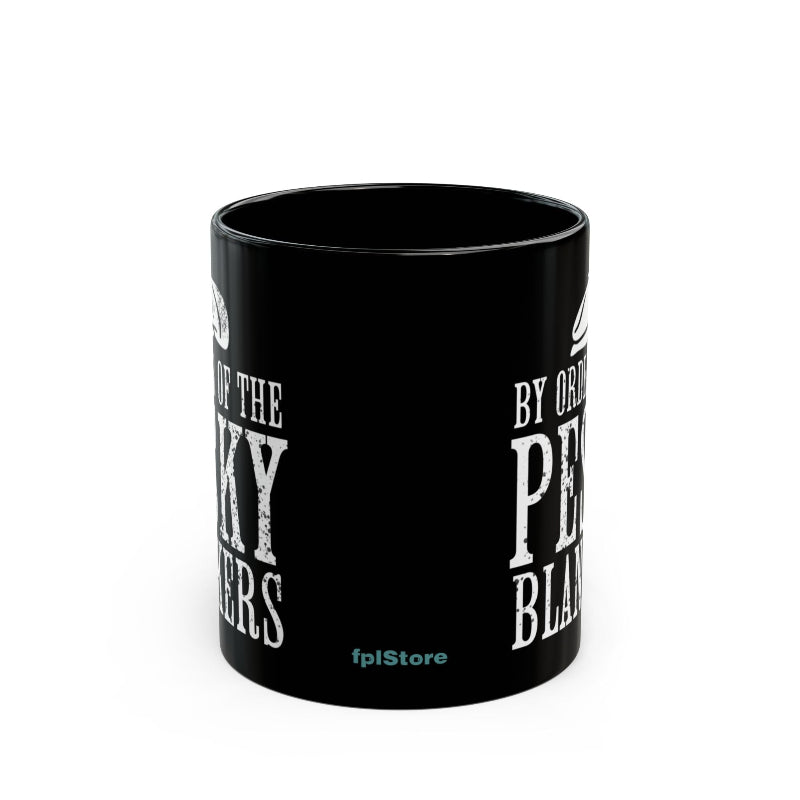 Black mug with white text on a white background
