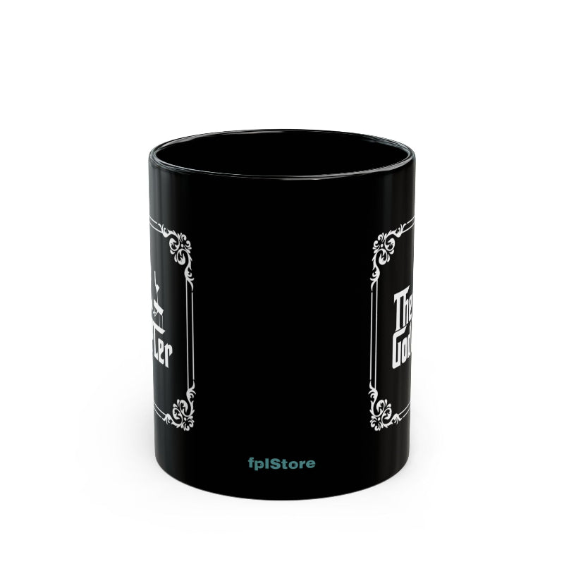 Black mug with white text and decorative elements on a white background