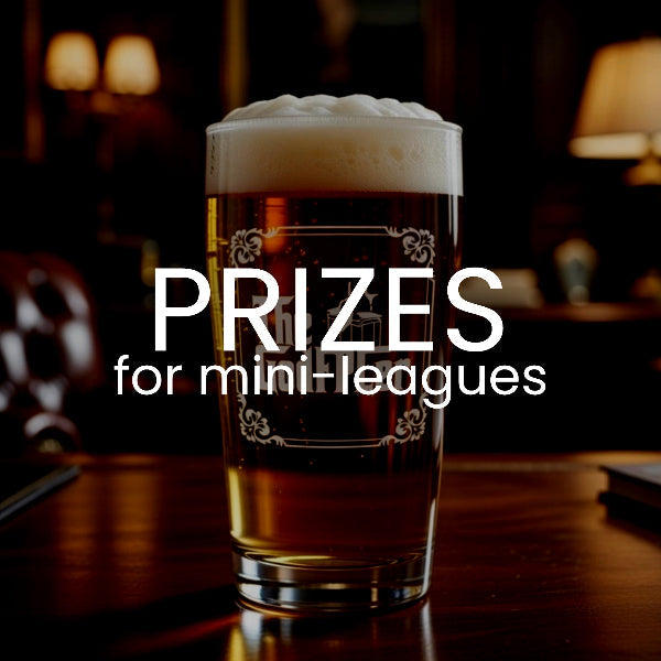 A frothy pint of amber beer in a clear glass with decorative etched borders, set on a wooden table in a dimly lit pub. Large white text across the center reads 'PRIZES for mini-leagues'.