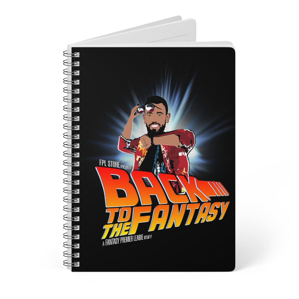Notebook with a superhero design and 'Back to the Fantasy' text on a black background
