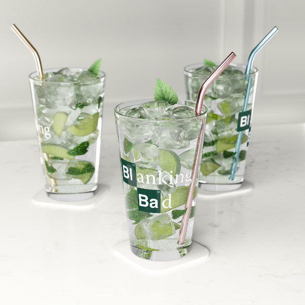 Three glasses of mojito with straws on a white background