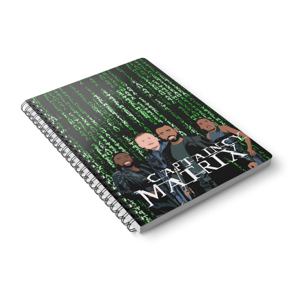 Notebook with 'Captain Matrix' design featuring characters and green text on a white background