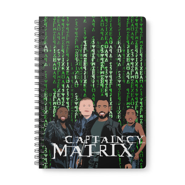Notebook with 'Captaincy Matrix' design featuring four characters and binary code background.