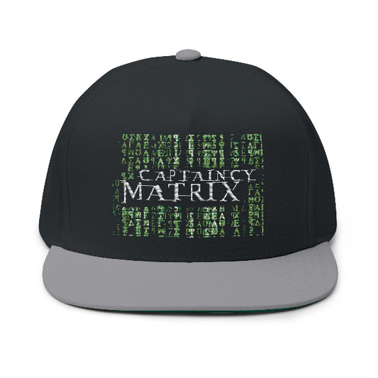 A black baseball cap with a gray flat brim, featuring a front graphic that reads 'CAPTAINY MATRIX' in white over a green digital matrix-style text pattern, shown on a plain white background.