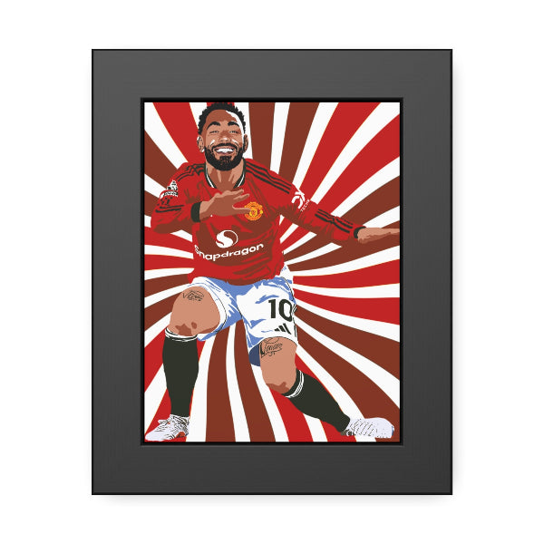 Framed artwork of a soccer player in a red jersey with a sunburst background