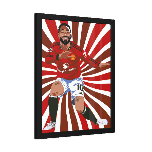 Framed artwork of a soccer player in a red jersey with a sunburst pattern