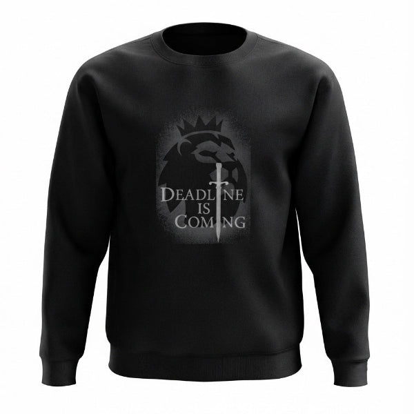 A black crewneck sweatshirt featuring a gray graphic on the chest with a lion head, a sword, and the text 'DEADLINE IS COMING' in a stylized font, shown against a plain white background.