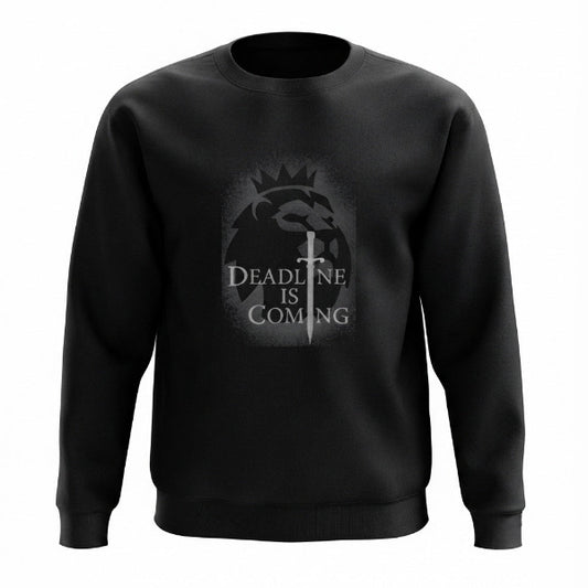 A black crewneck sweatshirt featuring a gray graphic on the chest with a lion head, a sword, and the text 'DEADLINE IS COMING' in a stylized font, shown against a plain white background.