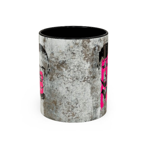 Cylindrical mug with a textured design and pink accents on a white background