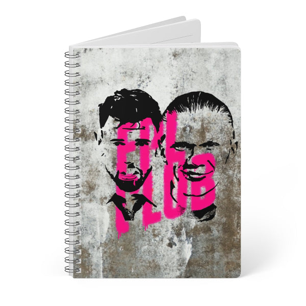Notebook with a design of two faces on a textured background