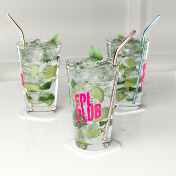 Three glasses of mojito with lime and mint, each with a different colored straw on a white background.