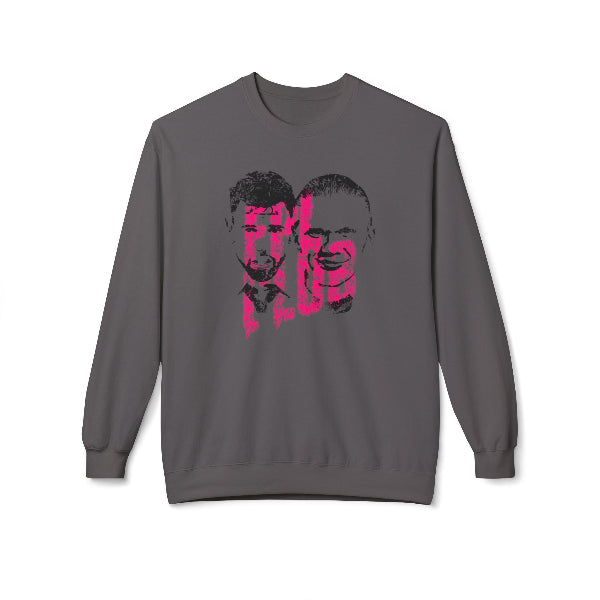 A dark gray crewneck sweatshirt featuring a stylized graphic print of two faces in black and hot pink, with the text 'I'M NOT A LEO' integrated into the design.