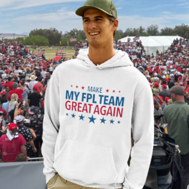 Person wearing a hoodie with 'Make My FPL Team Great Again' text at a political rally.