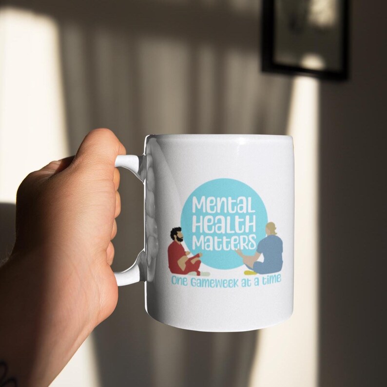 White ceramic FPL mug with Mental Health Matters design.
