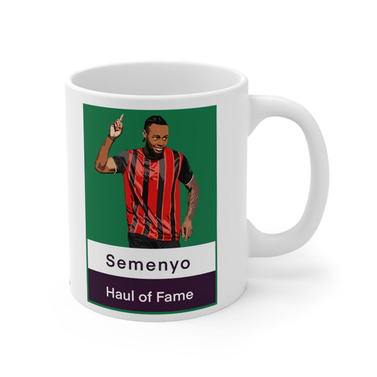 Mug with a graphic of a person in a red and black striped jersey on a green background, with text 'Semenyo Haul of Fame'.