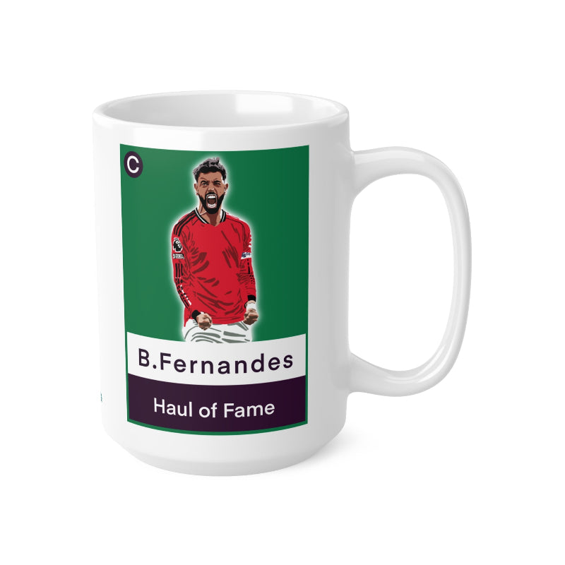Mug with a graphic of a person in a red jersey on a green background, featuring text and a logo.