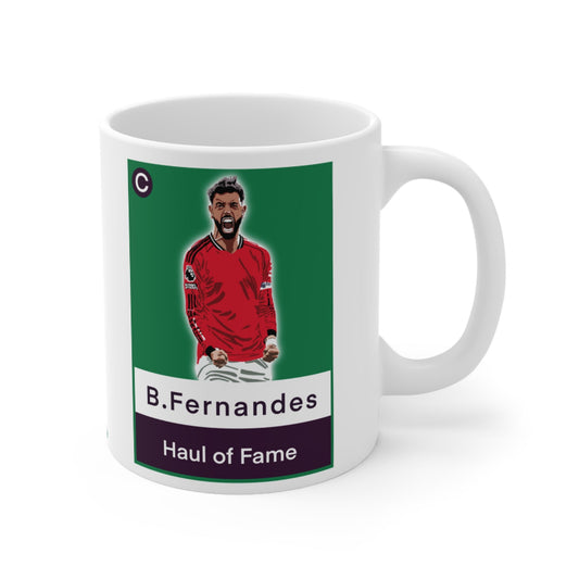 Mug with a graphic of a person in a red jersey on a green background