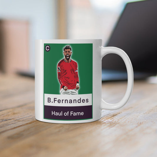 Mug with a graphic of a person in a red jersey on a blurred office background