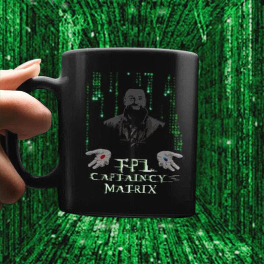 Black mug with a design of a man and text against a green matrix background