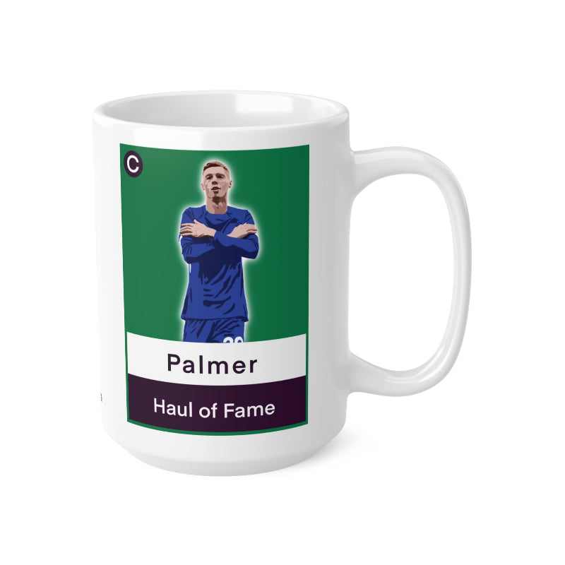 White mug with a graphic of a person in a blue outfit and text on a green background