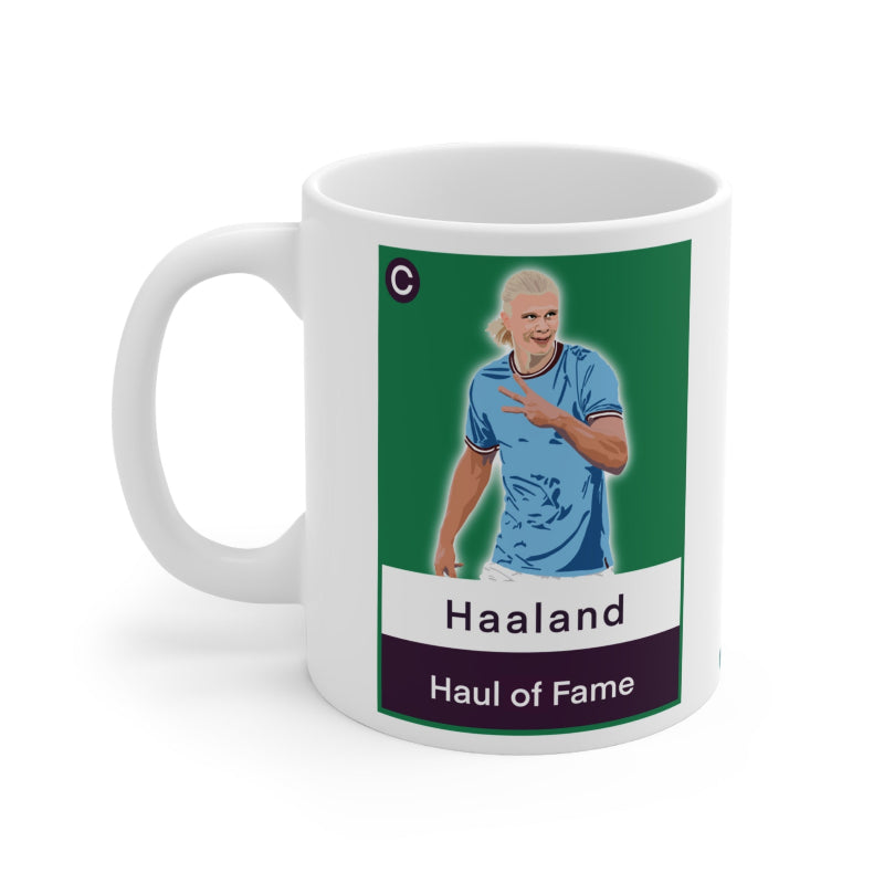 Mug with a graphic of a person in a blue jersey and text on a white background