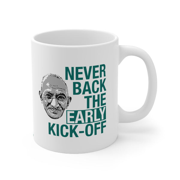 White mug with a graphic of a man's face and text 'Never back the early kick-off' on a white background