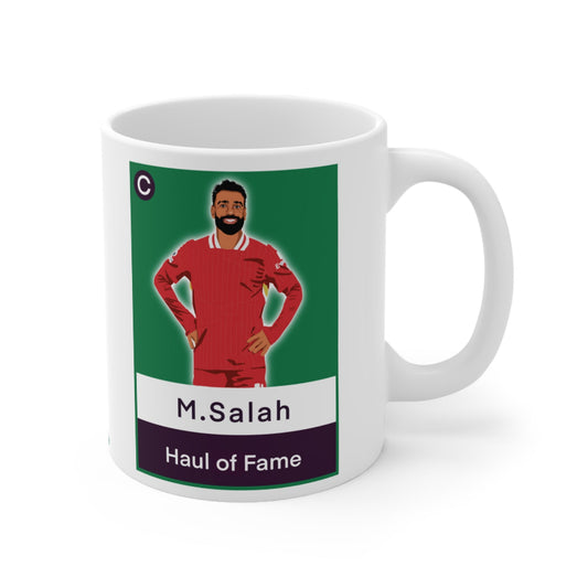 Mug with a graphic of a football player in a red jersey on a green background
