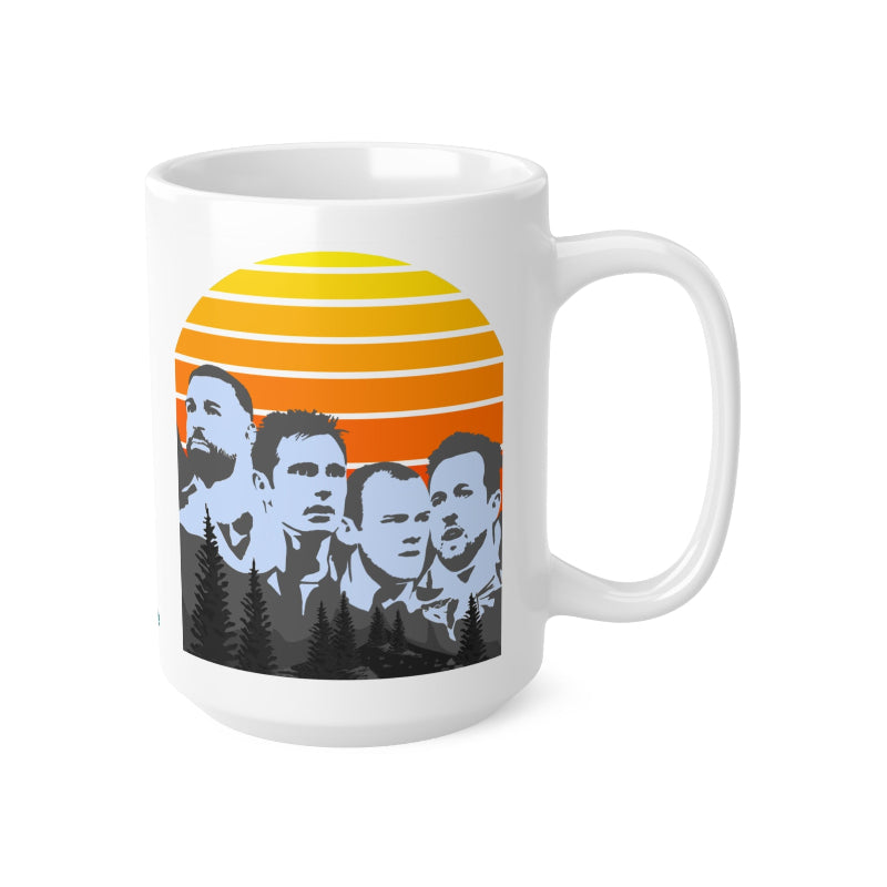 White mug with a design of a sunset and four silhouettes on a white background
