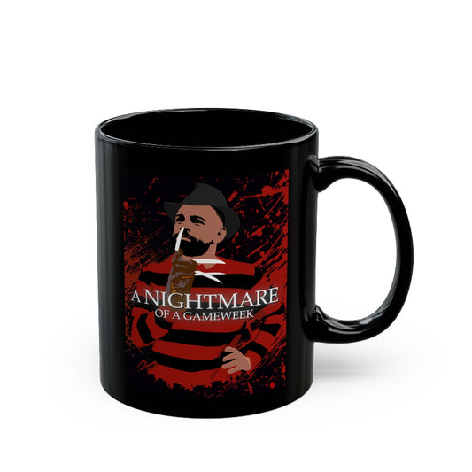 Black mug with a graphic design featuring a person and text 'A Nightmare of a Gameweek' on a red background.