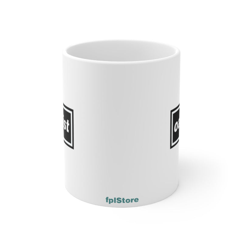 White mug with black square designs and 'fplStore' branding on a white background