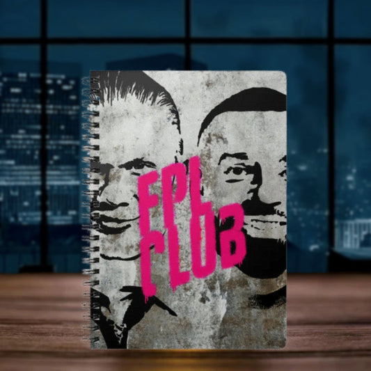 Notebook with a design of two faces and 'FPL CLUB' text on a cityscape background