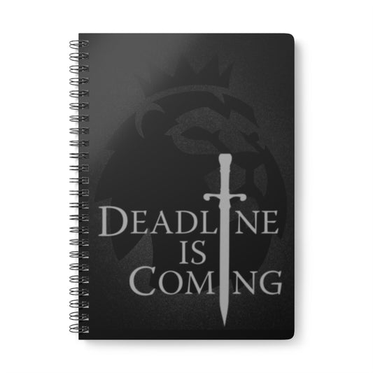 Black notebook with a sword design and 'Deadline is Coming' text on a white background