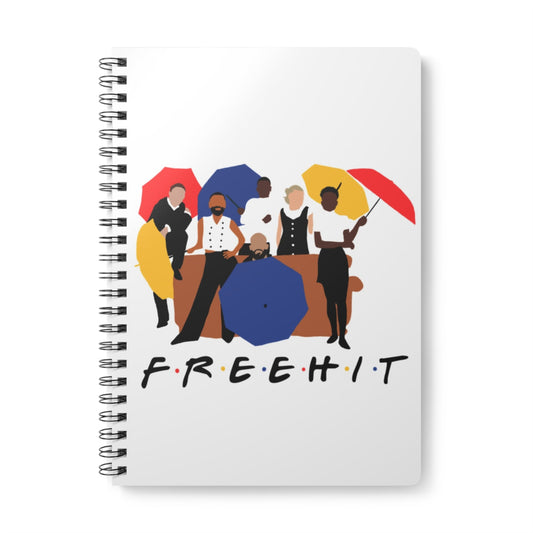 Notebook with illustration of people holding colorful umbrellas and the word 'FREEDOM' on a white background
