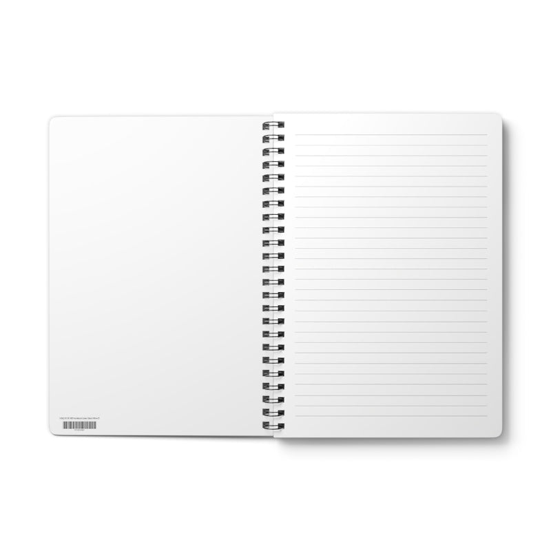 Open notebook with spiral binding on a white background