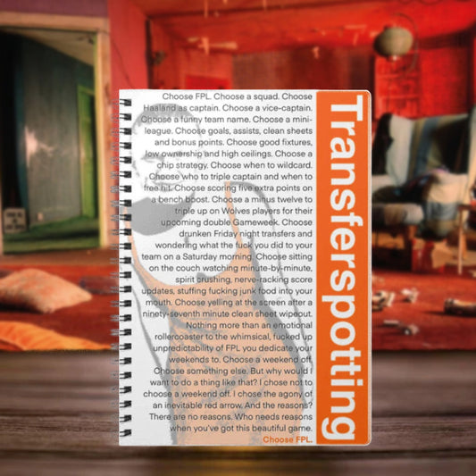 Notebook with text and 'Transferspotting' branding on a blurred background