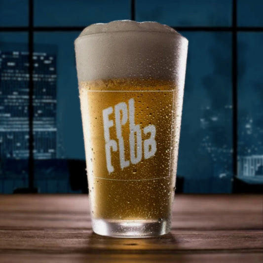 Pint of beer with foam and 'FPL CLUB' branding on a wooden surface with a cityscape background.