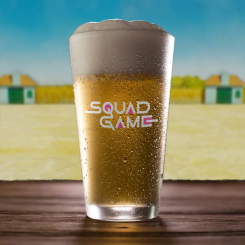 Pint glass with Squad Game text