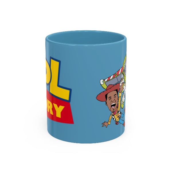 Blue mug with a cartoon character and colorful text on a white background