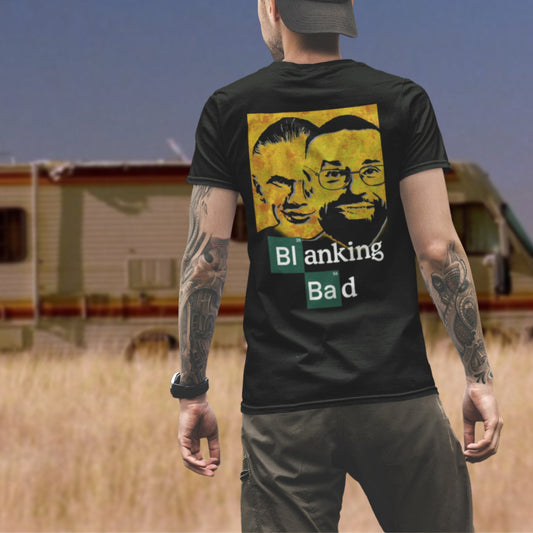 Person wearing a black t-shirt with a graphic design and text in an outdoor setting