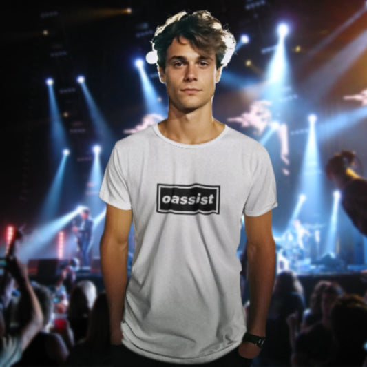 Person wearing a white t-shirt with 'oassist' logo at a concert with bright lights and stage.