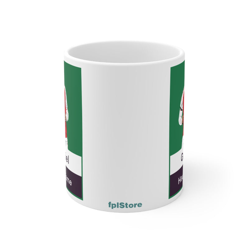 White mug with green and purple design on a white background