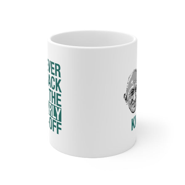 A white ceramic mug with a dark teal graphic print featuring the text 'I NEVER LACK THE FLY OFF' and a black-and-white portrait illustration, shown on a clean white background.