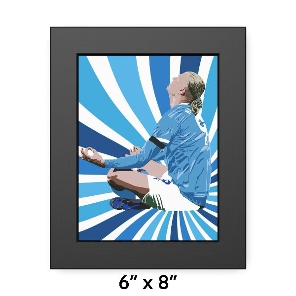 Framed artwork of a soccer player in a blue uniform against a blue and white striped background.