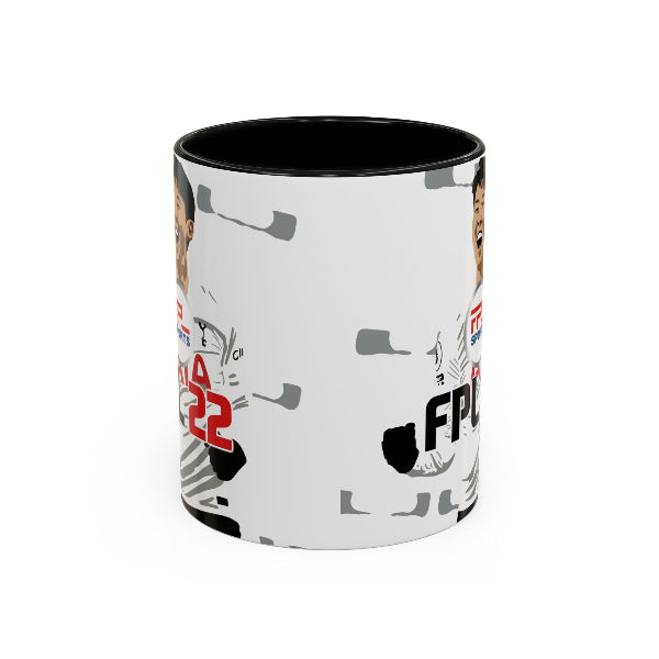 A ceramic mug with a black interior and rim, featuring a white exterior printed with a collage of sports figures, logos, and the number 22.