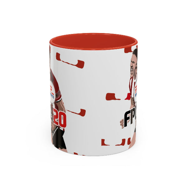 Mug with red interior and printed design on a white background