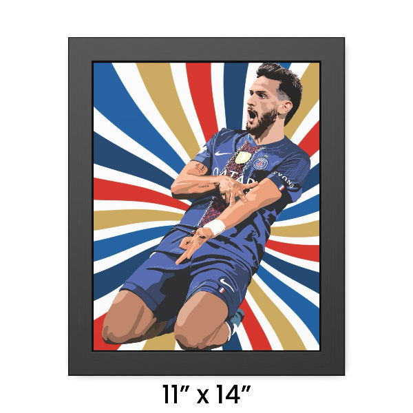 Framed artwork of a soccer player in a blue uniform with a colorful background