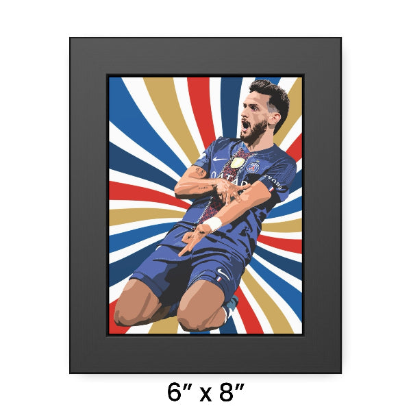 Framed artwork of a soccer player with a colorful abstract background