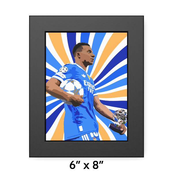 Framed artwork of a soccer player holding trophies with a colorful background